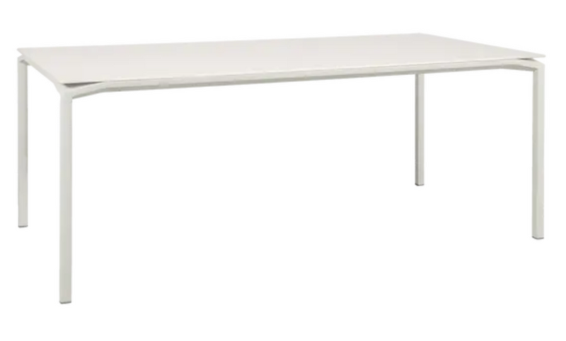 Load image into Gallery viewer, Fermob CALVI AERIS mineral dining table, 195 x 95 cm, eight-seater with a sleek table top for modern dining spaces.
