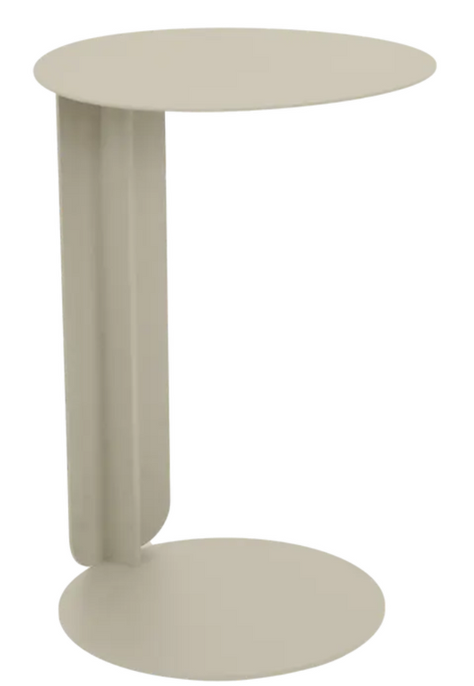 Clay grey Fermob Bebop Offset Table with metal construction, outdoor table designed for versatile use in outdoor spaces.