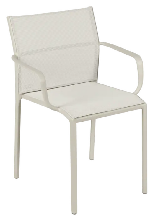Clay grey Fermob Cadiz outdoor armchair with aluminum frame and technical fabric, ideal for stylish outdoor seating.