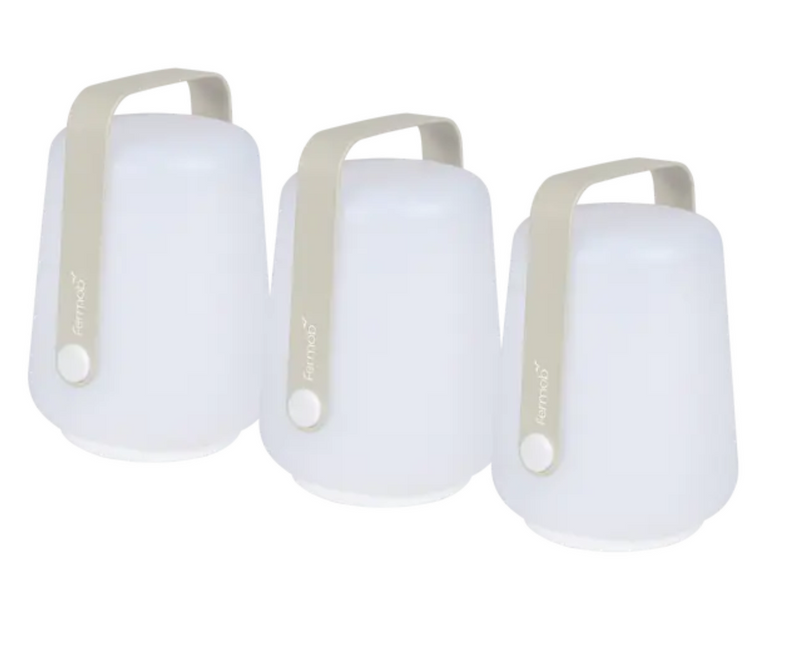 Load image into Gallery viewer, Set of three Fermob outdoor mini lamps, small round ballads in grey, 12 cm height, ideal for outdoor lighting.

