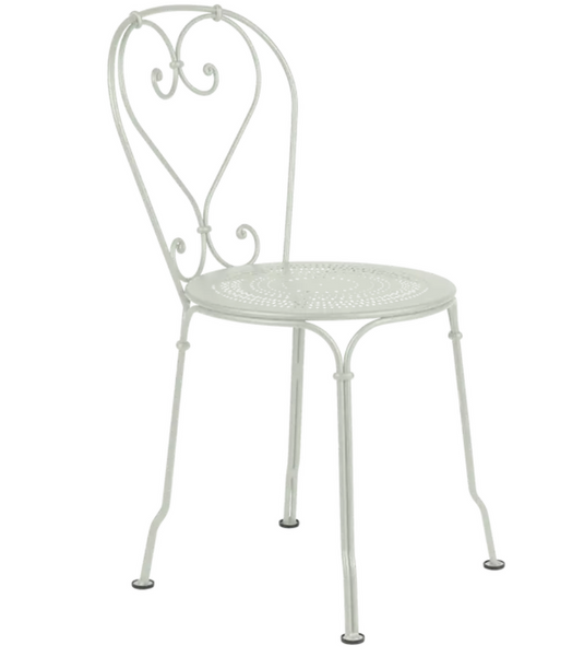 Cley Grey Fermob 1900 outdoor chair with a modern design, featuring a sturdy metal frame and slatted seat for outdoor use.