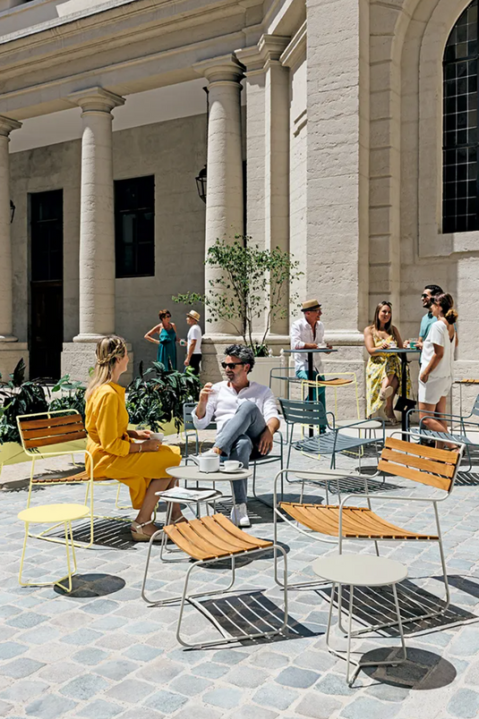 Small Fermob Cocotte occasional table with a Ø34cm round top and sleek design, perfect as a versatile accent table.