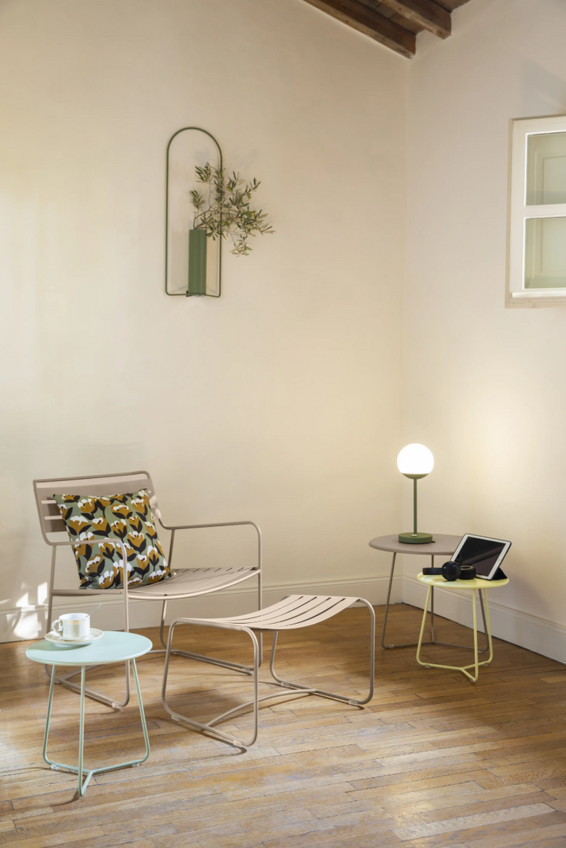 Load image into Gallery viewer, Small Fermob Cocotte Occasional Table with a round tabletop and slender legs, measuring 34cm diameter, suitable for living spaces.
