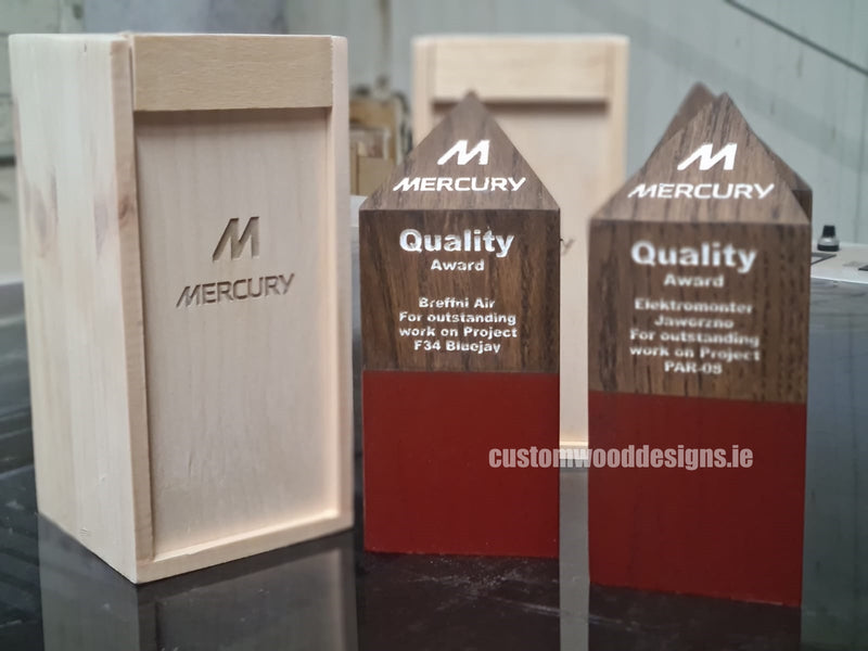 Load image into Gallery viewer, Custom Wood Designs wooden awards with engraved branding for recognition and achievement, displayed on a wooden surface.
