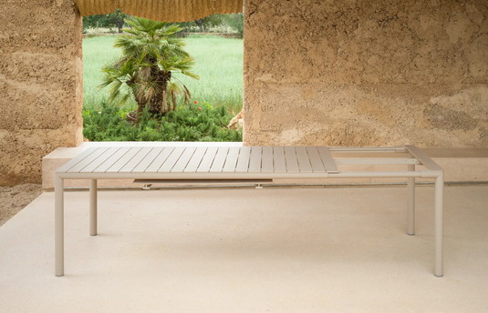 Nardi Tevere 210 extendable outdoor table with wooden slats and metal frame, suitable for patio or garden dining.