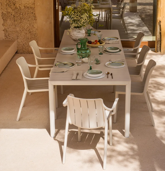 Nardi Tevere 210 extendable outdoor table with a sleek wooden top and sturdy legs, ideal for outdoor dining and gatherings.