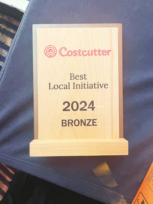 Custom Wood Designs wooden awards for recognition and achievements, featuring elegant handcrafted designs and engraved details.