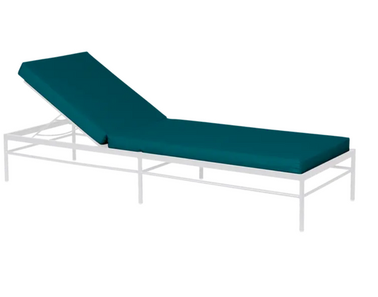 Cotton white and midnight green Fermob Rivage luxury metal sunlounger with adjustable backrest on outdoor patio.