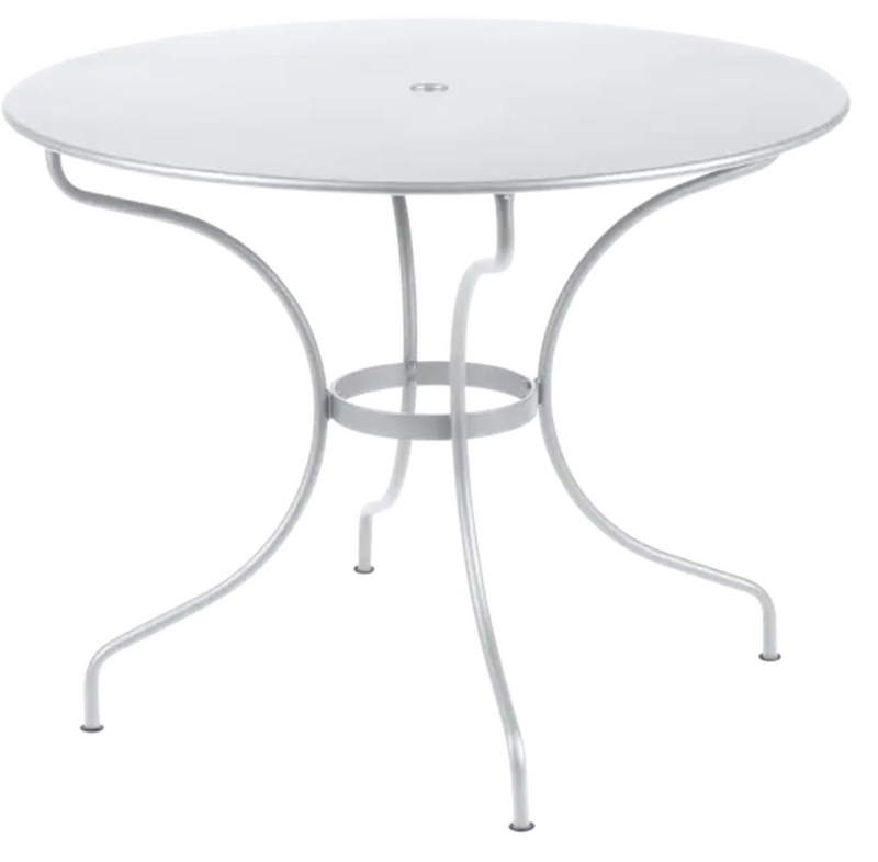 Load image into Gallery viewer, Fermob OPÉRA+ outdoor metal table with 96 cm diameter in Cotton White, suitable for five-seater patio dining.
