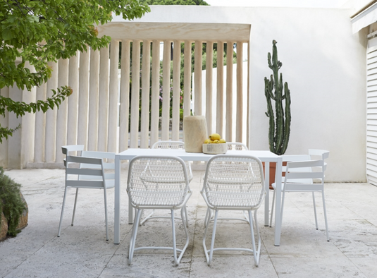 Cotton white Fermob Sixties outdoor stackable chair for restaurant and hospitality seating in Ireland.