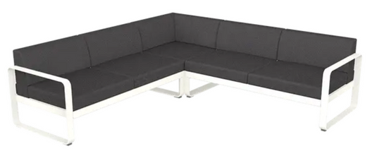 Fermob Bellevie Composition 2 outdoor lounge set with white cotton cushions and graphite grey modular sofa for stylish outdoor seating.