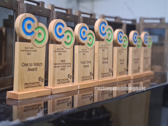 Custom Wood Designs award plaque for Local Enterprise Awards 2021, featuring engraved branding and a polished wood finish.
