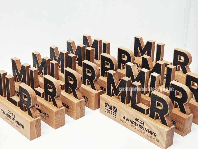 Load image into Gallery viewer, Custom Wood Designs engraved wooden awards for corporate, gym, and coffee awards, showcasing sustainable, custom-made award designs.
