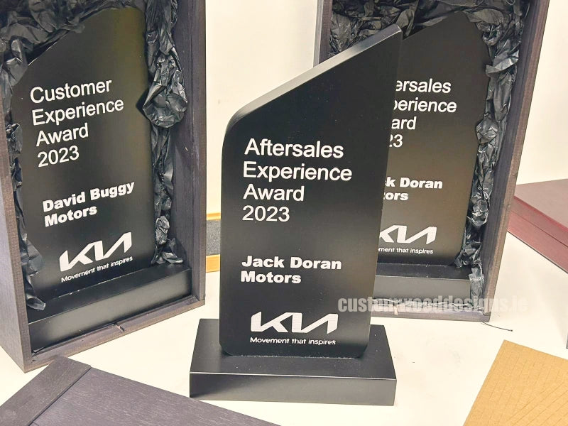 Load image into Gallery viewer, Custom Wood Designs awards featuring wooden design and KIA Motors branding for corporate gifting and business recognition in Ireland
