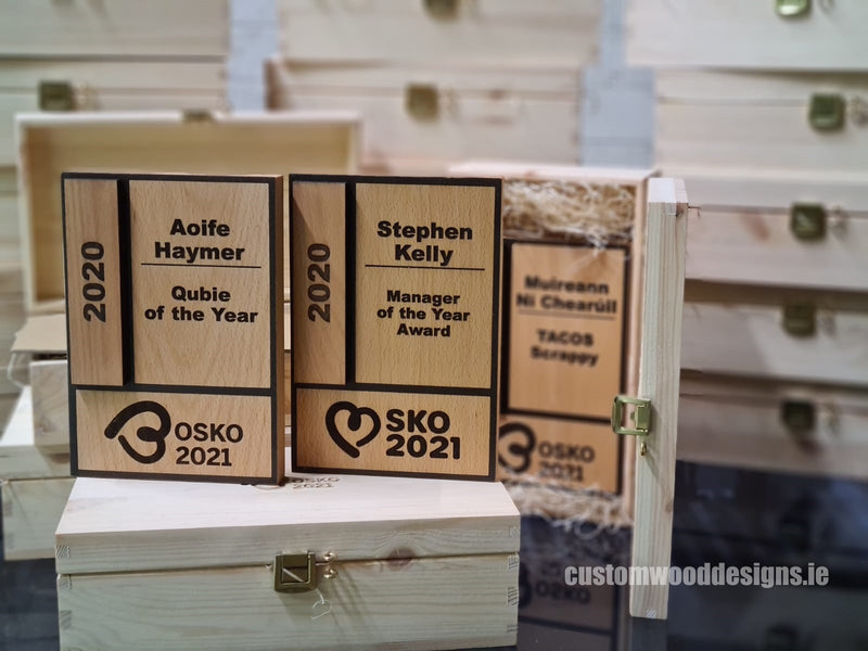 Load image into Gallery viewer, Laser-engraved wooden custom award plaques with company logos, crafted by Custom Wood Designs for trophies and awards.
