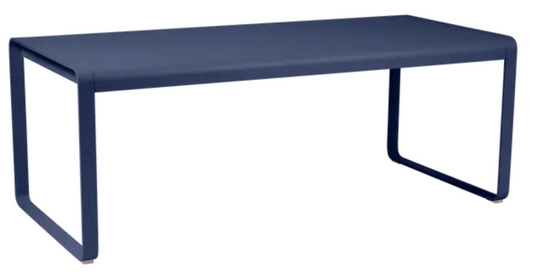 Fermob Bellevie outdoor metal dining table, 196 x 90 cm, deep blue, eight-seater, suitable for outdoor patio or garden use.