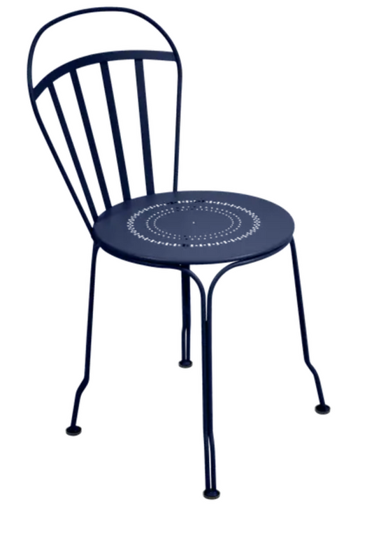 Deep blue Fermob Louvre outdoor chair with sleek metal design, ideal for patio or garden seating.