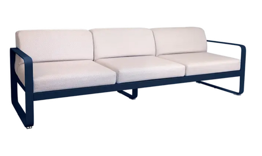 Deep blue Fermob Bellevie 3-seater outdoor sofa with metal frame, ideal for garden or patio seating.