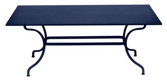 Deep blue Fermob Romane table, 180 x 100 cm, set for up to 8 guests, outdoor dining furniture with sleek design.