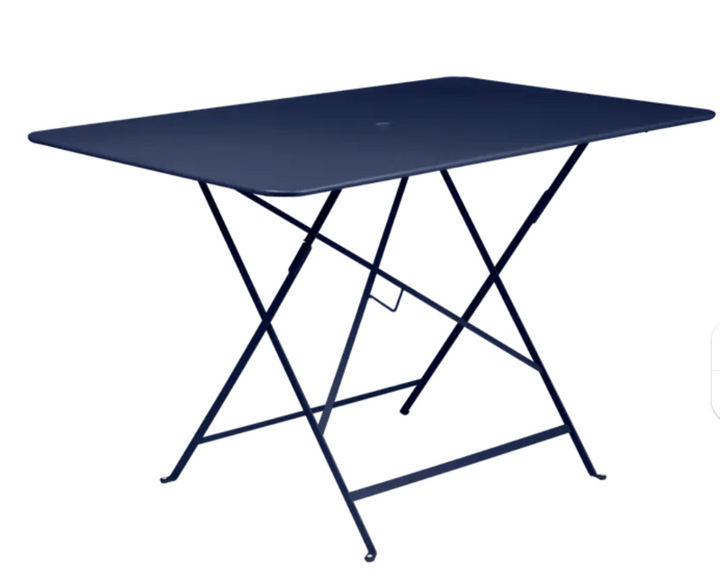 Load image into Gallery viewer, Deep blue Fermob foldable bistro table, 117 x 77 cm, outdoor metal furniture with a sleek, compact design for outdoor dining and patio use.

