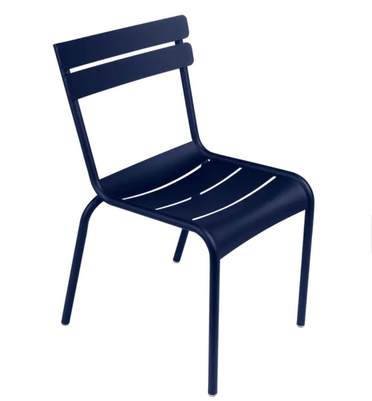 Deep blue Fermob Luxembourg armchair with a sleek metal design, stackable for easy storage, ideal for modern indoor or outdoor seating.