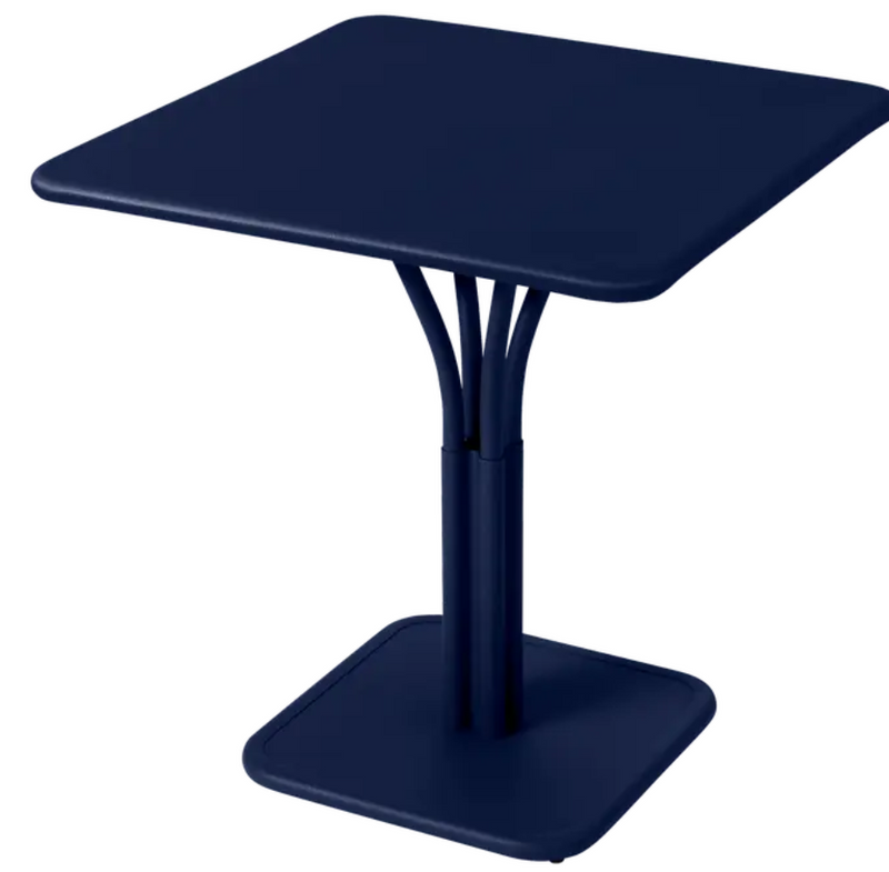 Load image into Gallery viewer, Deep blue Fermob Luxembourg metal outdoor table with 71x71-inch solid aluminum top, ideal for restaurant or patio use.
