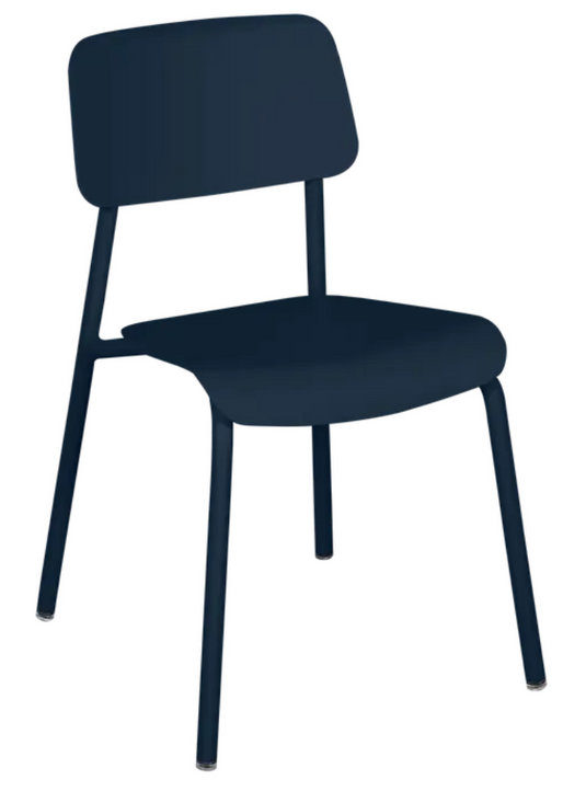 Deep blue Fermob Studie outdoor chair with a sleek, modern design, perfect for outdoor seating and patio furniture.