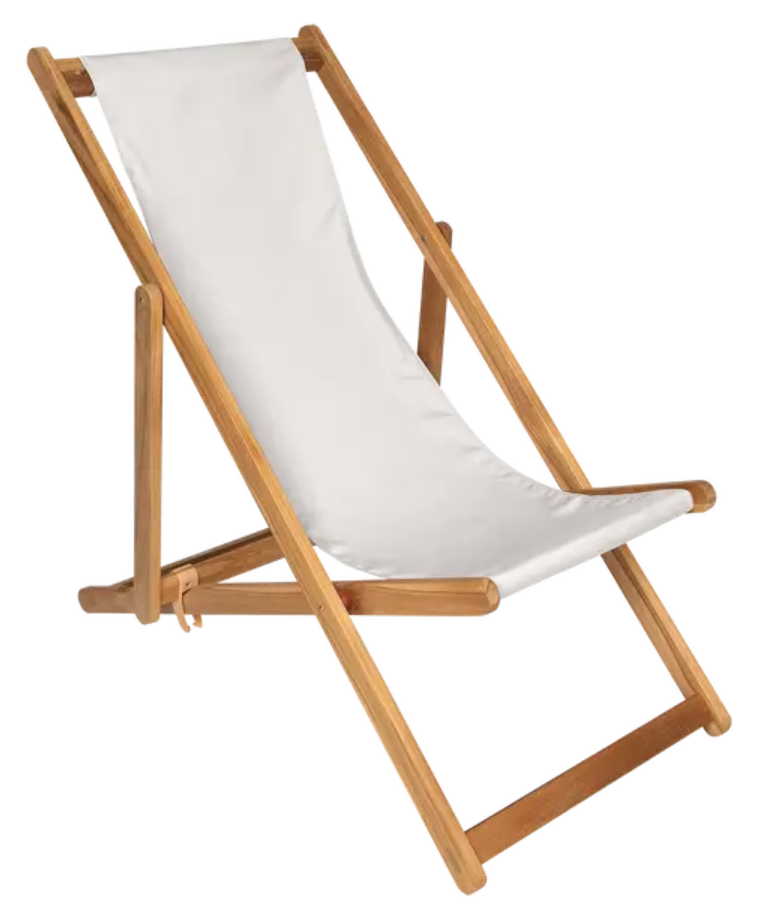 Load image into Gallery viewer, Fermob Ibiza teak deck chair with ecru cushions, showing a stylish outdoor lounge chair with wooden armrests and slatted design.
