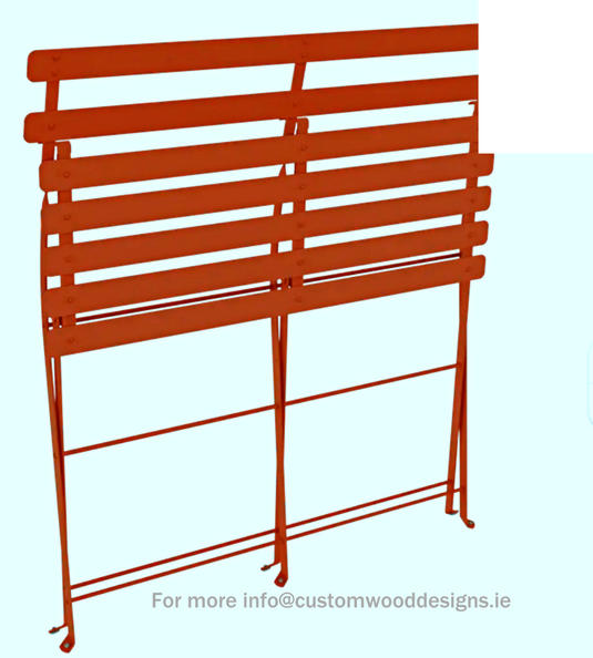 Fermob candied orange two-seater folding bench ottoman, stylish outdoor furniture with a vibrant orange finish.