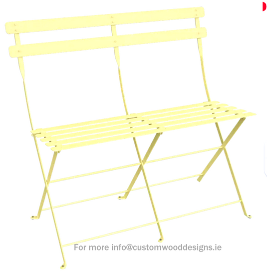 Fermob frosted lemon two-seater folding ottoman bench, lightweight and stylish for indoor or outdoor use.