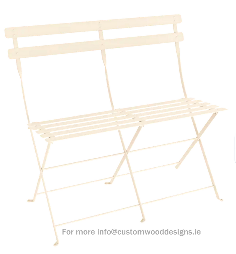Load image into Gallery viewer, Fermob latte beige two-seater folding ottoman bench with wooden legs, designed for versatile seating and style.
