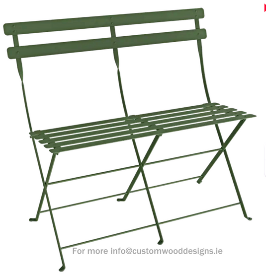 Fermob Bistro Two Seater Ottoman folding bench in rosemary color, designed for indoor or outdoor seating and relaxation.