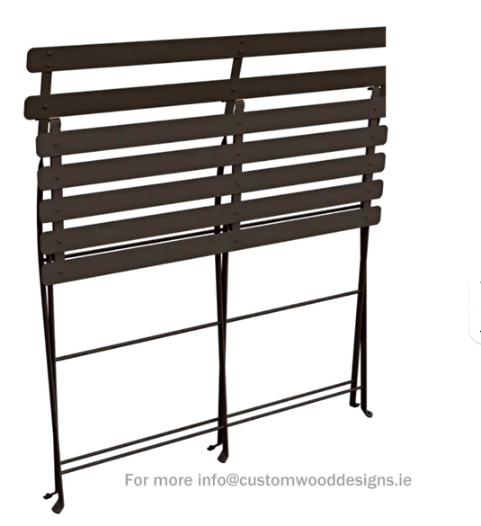 Fermob Tonka brown two-seater folding bench ottoman, wooden frame with cushioned top, ideal for indoor or outdoor seating.