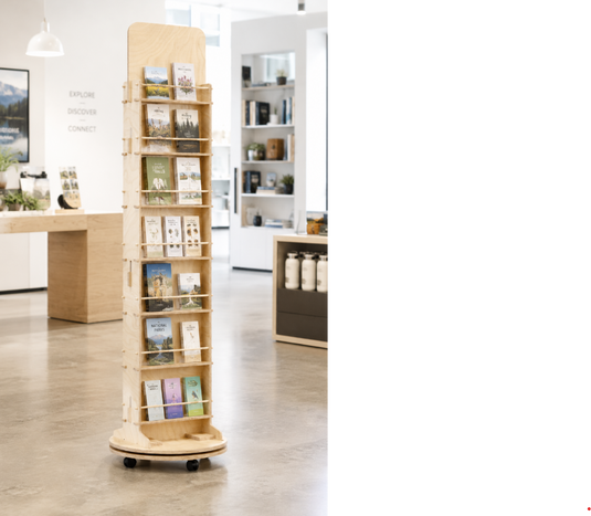 Esposit floor display unit with rotating stand holding brochures, books, and small items for easy browsing.