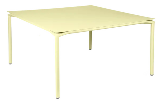 Fermob CALVI square dining table, 140x140 cm, metal table with frosted lemon finish, ideal for eight-seater dining spaces.