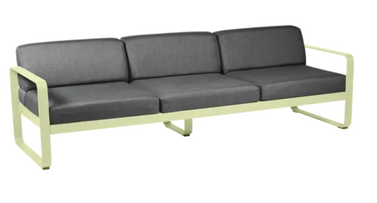 Fermob Bellevie 3-seater outdoor sofa with frosted lemon and graphite grey metal frame, suitable for patio or garden seating.