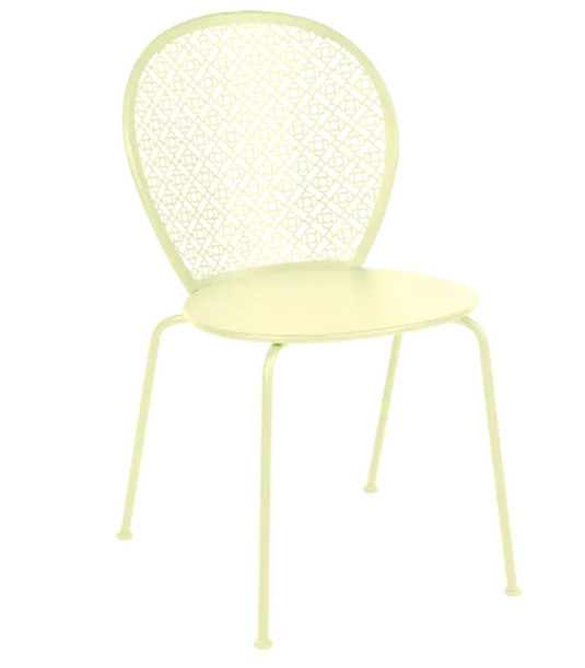 Fermob Lorette outdoor metal chair in frosted lemon color, featuring a colorful, modern design for outdoor patio furniture.
