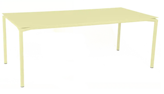 Fermob Calvi rectangular outdoor dining table, 195 x 95 cm, eight seater with frosted lemon finish, suitable for outdoor and indoor use.