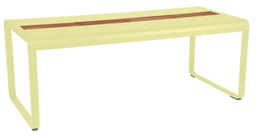 Fermob Bellevie outdoor dining table, 196x90 cm wood and metal, eight-seater with built-in storage, frosted lemon finish.
