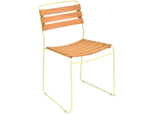 Fermob outdoor metal chair with frosted lemon and white finish, stylish Surprising Teak Chair for outdoor garden or patio use.