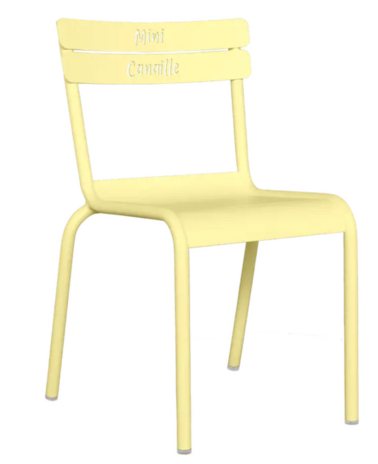 Fermob Luxembourg Kid Chair in frosted lemon color, small French-style children's chair with a modern design and open back.