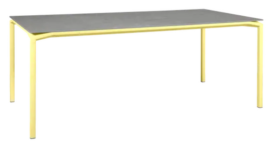 Fermob CALVI Kreta mineral dining table, 195x95 cm, with eight seats, frosted lemon color, modern outdoor table design
