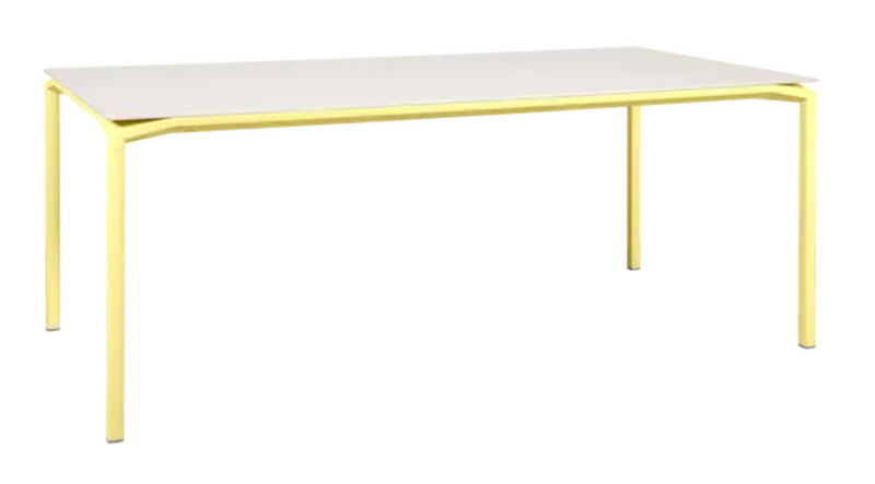 Load image into Gallery viewer, Fermob Calvi Aeris mineral dining table with frosted lemon finish, 195x95 cm, eight-seater outdoor table for commercial use
