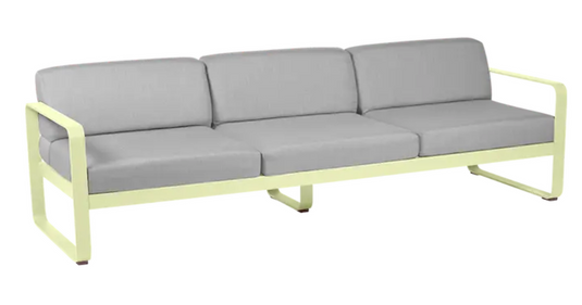 Fermob Bellevie 3-seater outdoor sofa with grey metal frame and soft fabric cushions for patio or garden seating.