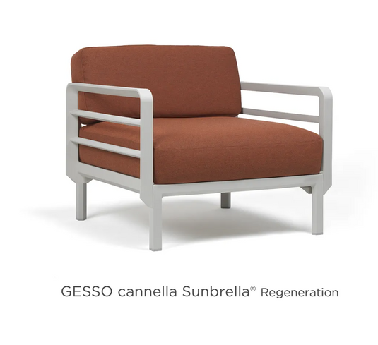 Nardi Maximo modular outdoor armchair with cream cushion and Sunbrella fabric, part of a versatile outdoor sofa set.