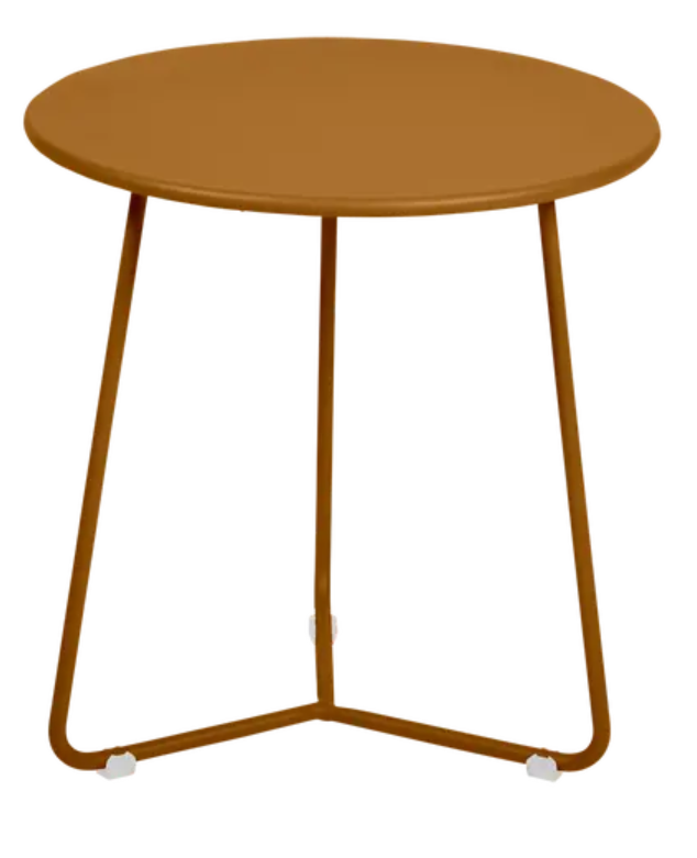 Load image into Gallery viewer, Fermob small ginger-colored Cocotte occasional table with a round top and slender legs, designed for versatile indoor or outdoor use.
