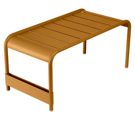 Fermob Luxembourg large low table or bench in gingerbread color, 86x44cm, with a smooth wooden surface and sturdy legs.