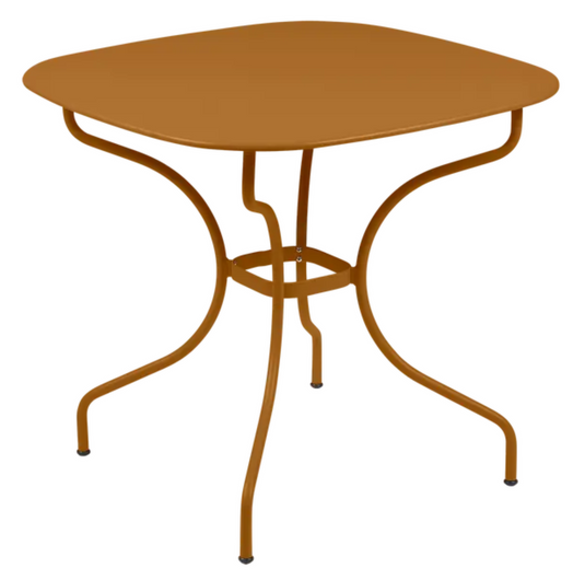 Fermob OPÉRA+ Carronde outdoor metal table in gingerbread color, 82x82 cm, suitable for garden or patio seating.