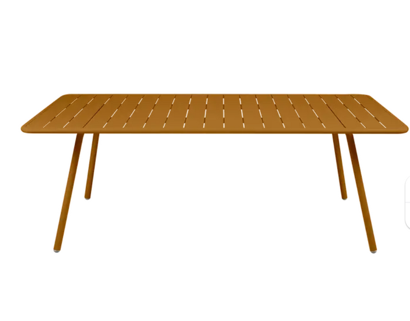 Load image into Gallery viewer, Fermob Luxembourg outdoor table, 207x100 cm, with a gingerbread finish, suitable for outdoor dining and patio use
