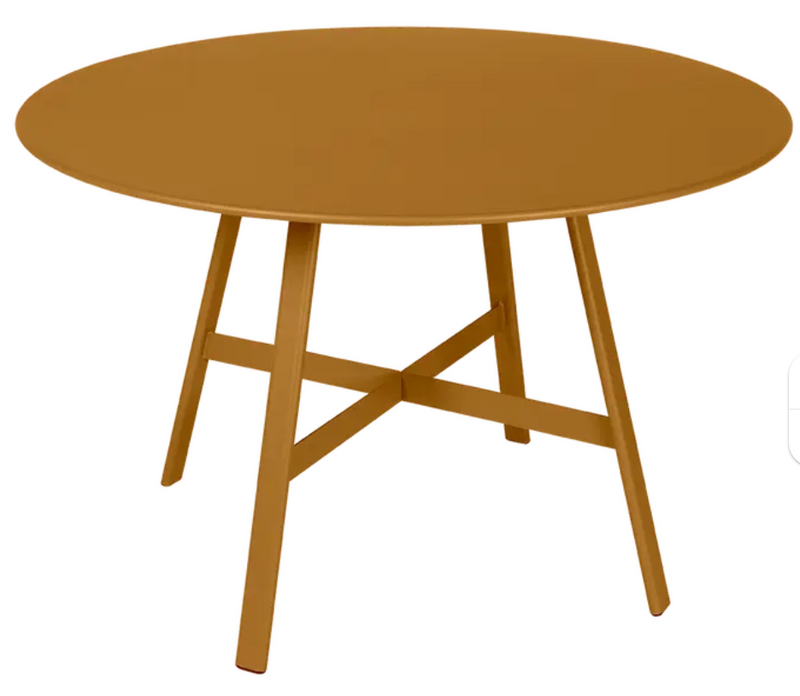 Load image into Gallery viewer, Fermob SO'O oval oak table with 117cm diameter, restaurant or hotel setting, showcasing smooth wooden surface and elegant design.
